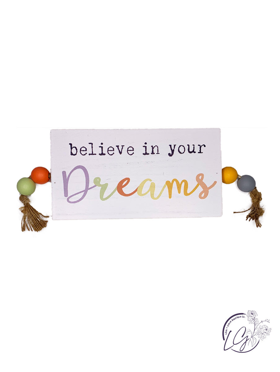 WOOD TABLETOP/WALL SIGN WITH BEADS AND TASSEL